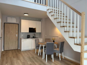 Dwupoziomowy apartament nr 24 z dużym balkonem i podziemnym parkingiem we Władysławowie